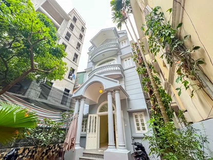 Cozy 4-bedroom house with yard for rent on To Ngoc Van Street, Tay Ho area