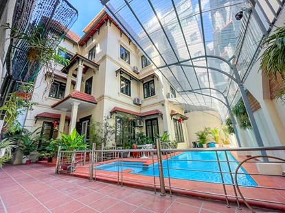 Affordable 6-bedroom villa with semi-furnished and private pool for rent on Dang Thai Mai Street, Tay Ho area
