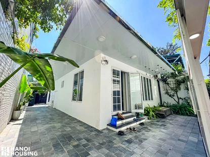 Cozy house with 2 bedrooms and garden for rent on Xom Chua street