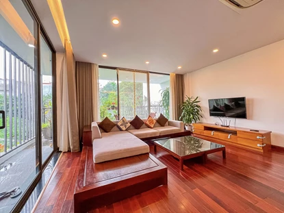 Well-maintained 3 bedroom apartment with spacious balcony and swimming pool for rent in Tay Ho area, Hanoi.