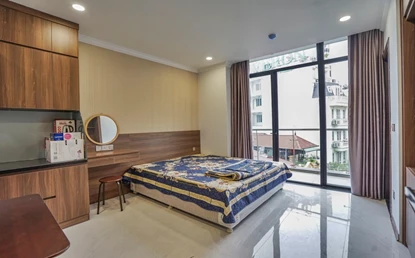 Street view studio apartment with balcony for rent in Truc Bach area, Hanoi