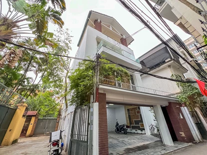 Beautiful 4-bedroom house for rent on To Ngoc Van street, with car parking