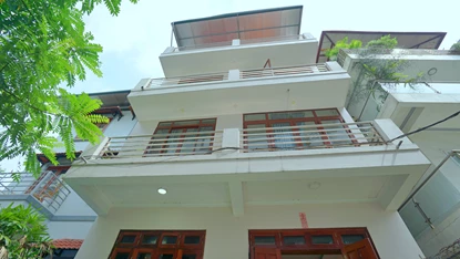 Tay Ho house for rent with 4 bedrooms, 4 private bathrooms, garden, balcony and terrace