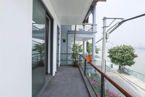 Bright and pretty 2 bedroom apartment with a nice balcony and lake view for rent in Tay Ho