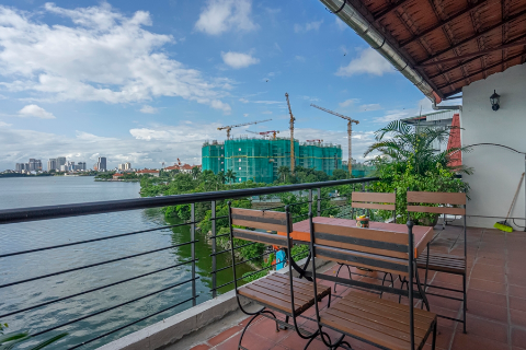 Lake view 3 bedroom apartment with a large balcony for rent on Quang Khanh street, Tay Ho