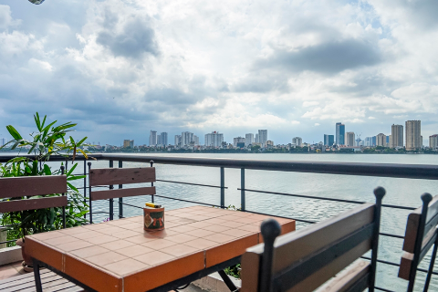 Lake view 3 bedroom apartment with a large balcony for rent on Quang Khanh street, Tay Ho