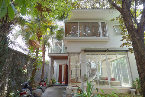 Modern and full of natural light house for rent in Tay Ho with a beautiful garden, car access