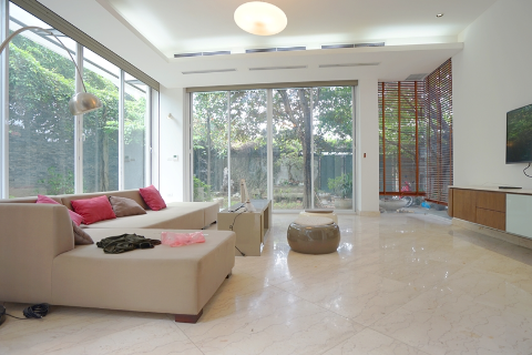 Modern and full of natural light house for rent in Tay Ho with a beautiful garden, car access