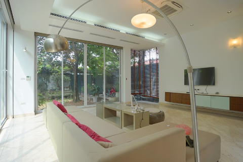 Modern and full of natural light house for rent in Tay Ho with a beautiful garden, car access