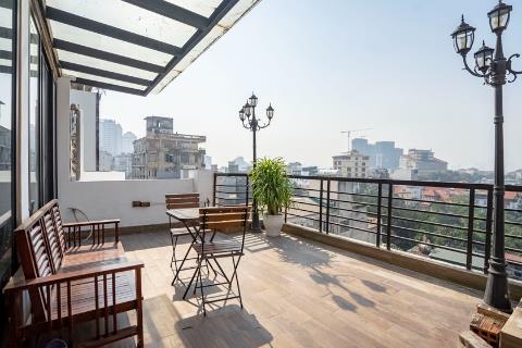 Lake view apartment with 2 bedrooms and a huge balcony for rent on To Ngoc Van street, Tay Ho