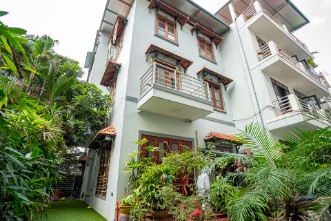 Beautiful 4 bedroom house with spacious garden in Tay Ho for rent.