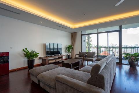 Lake view and modern 3 bedroom apartment with a large balcony for rent on Tu Hoa street, Tay Ho