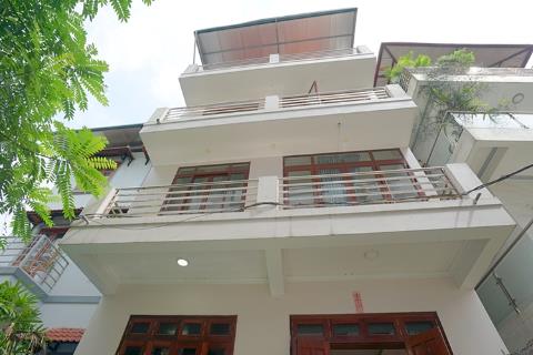 Tay Ho house for rent with 4 bedrooms, 4 private bathrooms, garden, balcony and terrace