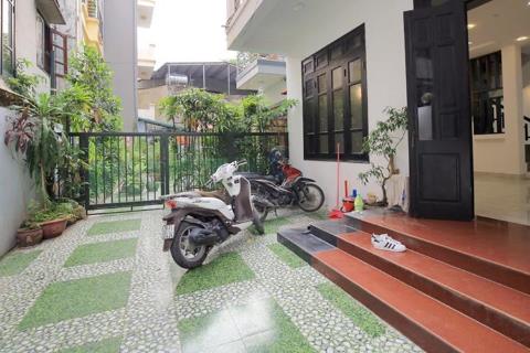 Tay Ho house for rent with 4 bedrooms, 4 private bathrooms, garden, balcony and terrace