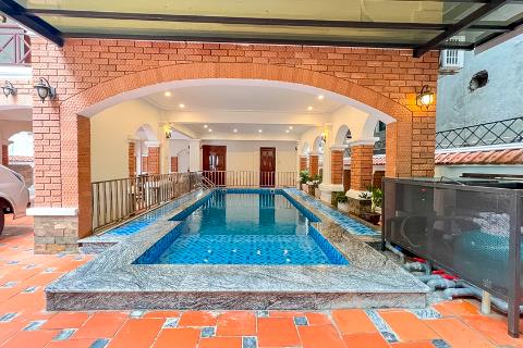 4 bedroom villa for rent with large garden and swimming pool on To Ngoc Van street, Tay Ho, Hanoi