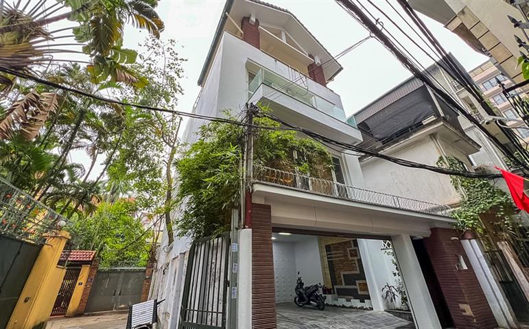 Beautiful 4-bedroom house for rent on To Ngoc Van street, with car parking