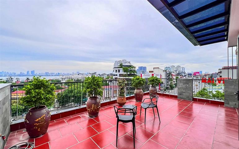  Spacious 1-bedroom rooftop apartment, large balcony on Nghi Tam street, Tay Ho