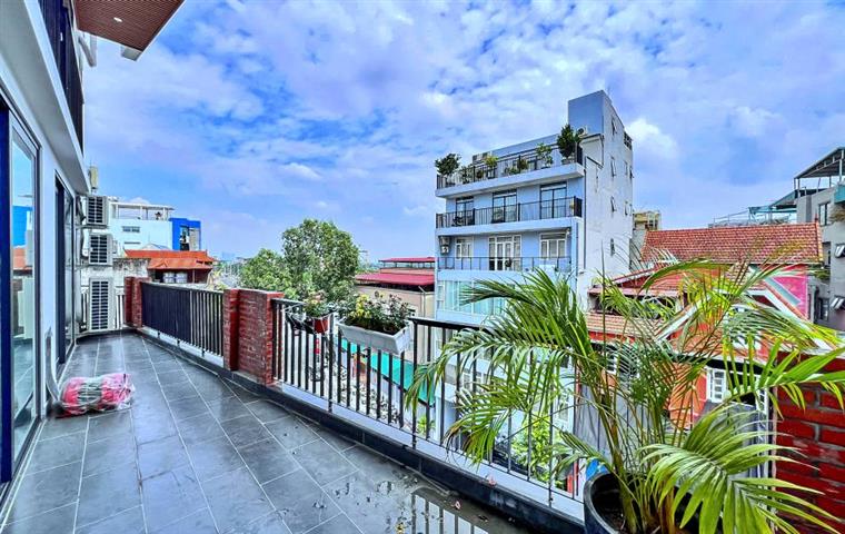 Brand new and modern 3 bedroom apartment with large balcony for rent on Xuan Dieu street